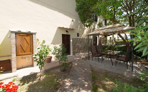 Feriebolig Tramonto: Hage, Utendørs