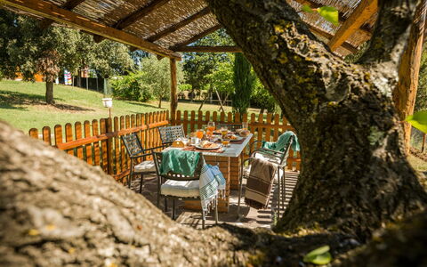 Feriebolig Montelopio 7: Hage, Utendørs