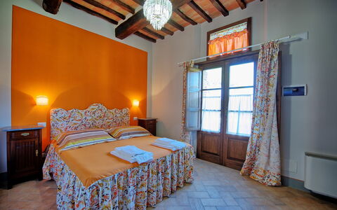 Feriebolig Granaio Apartment: soverom