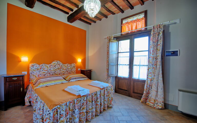 Feriebolig Granaio Apartment: soverom