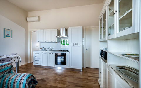 Feriebolig Timone: Kjøkken, Lunsjrom, Stue