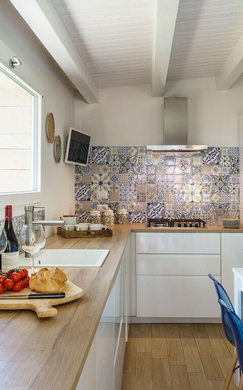 Marinella Punta Milocca: Kjøkken, Lunsjrom