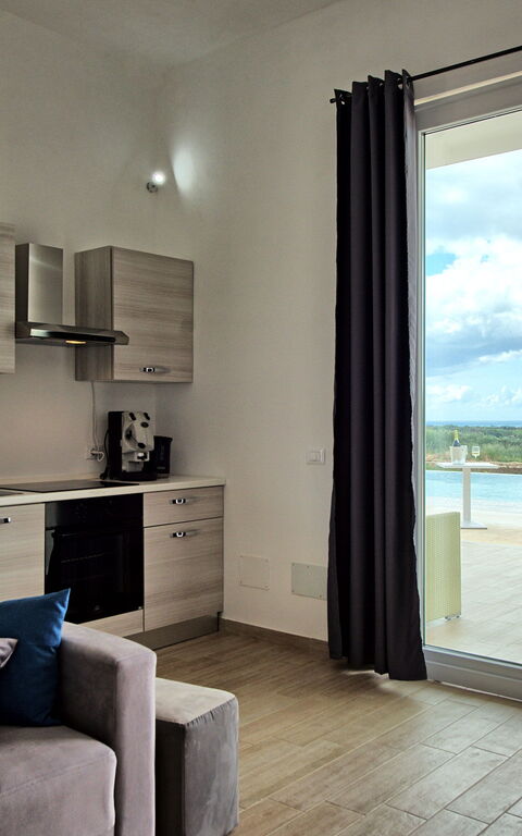 Villa Infinito: Kjøkken, Stue